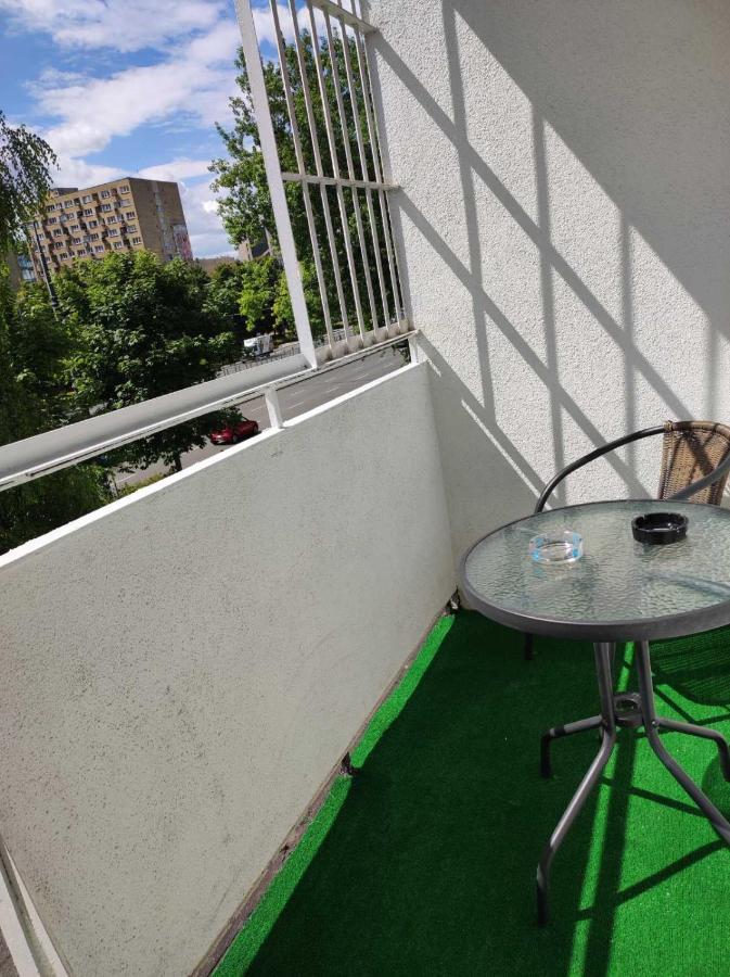 With A Balcony In The Very Center Of