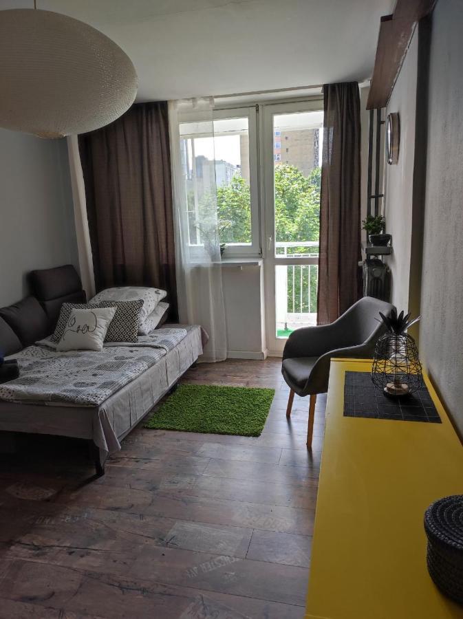 With A Balcony In The Very Center Of